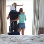https://www.shutterstock.com/image-photo/family-child-looking-out-window-hotel-1903865143