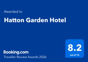 Blue graphic showing that Hatton Garden Hotel received an 8.2 out of 10 rating in the Booking.com Traveller Review Awards 2026. White and blue text highlights why this is one of the top hotels in Farringdon.